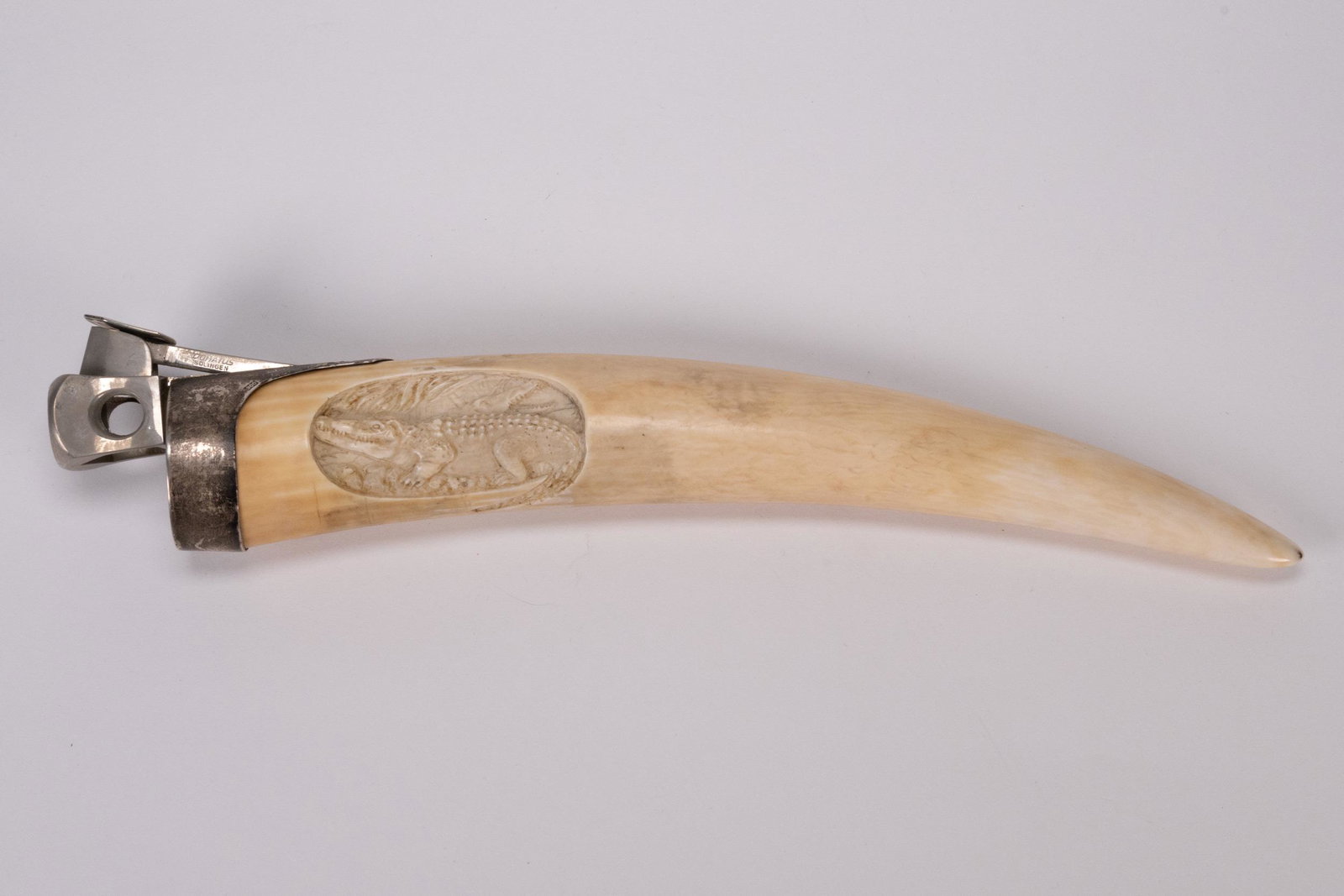 Sterling Silver Bone Fang Cigar Cutter: Antique Sterling Silver Bone Famg Cigar Cutter Silver Stamped " 900 Donatus Solingen " Depicting Hand Carved Animal Motif - Alligators " 11 3/8"L In Overall Good Condition Please look at Photos Closel
