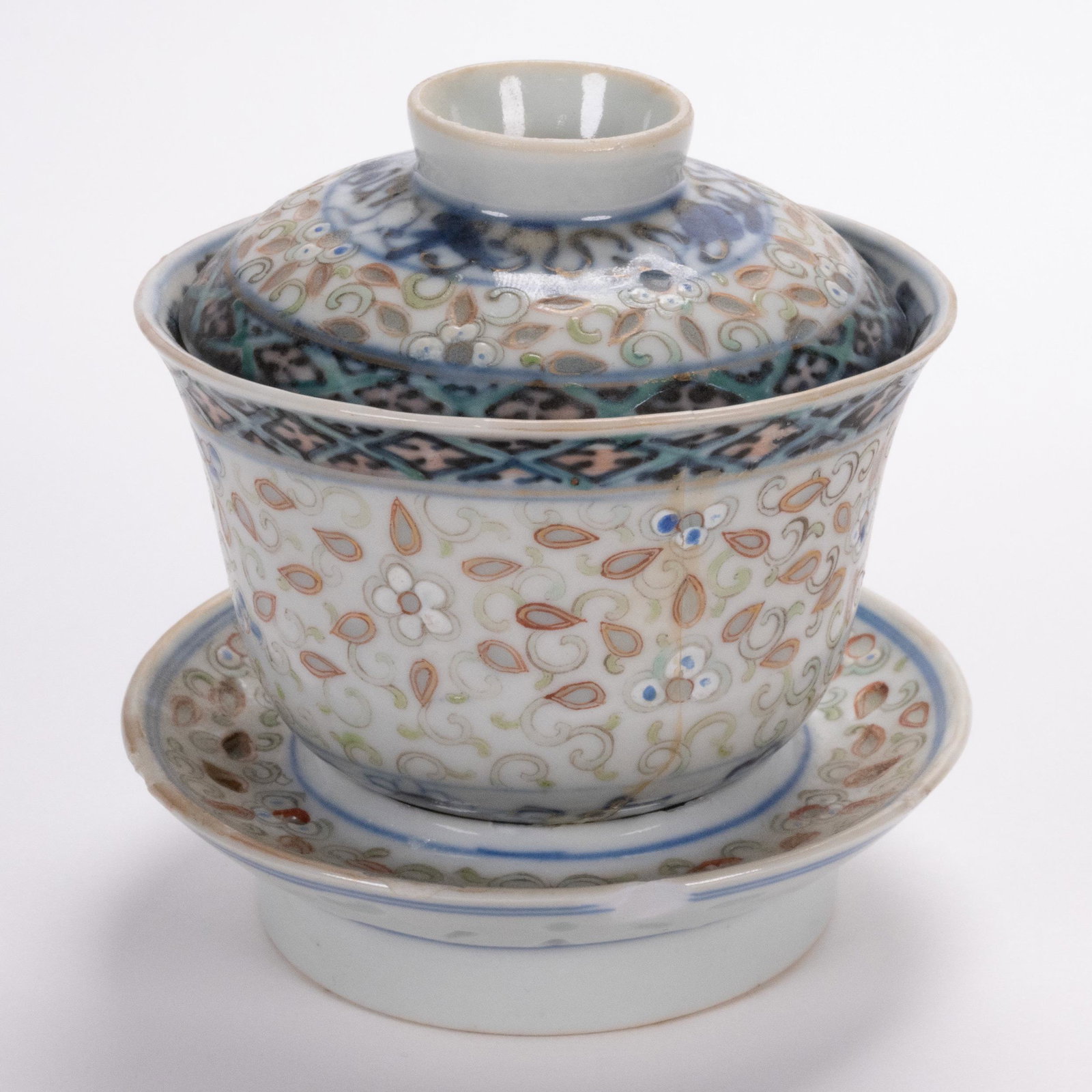 Chinese Porcelain Gaiwan Tea Cup: Chinese Porcelain Gaiwan Tea Cup Floral Motif Stamped Underneath And On Top Of Lid Hongxian Mark ? Signed on Bottom Four Character Blue Mark 3,75"H x 3,75"W Due To Age And Use Lid Have Few Small Chips