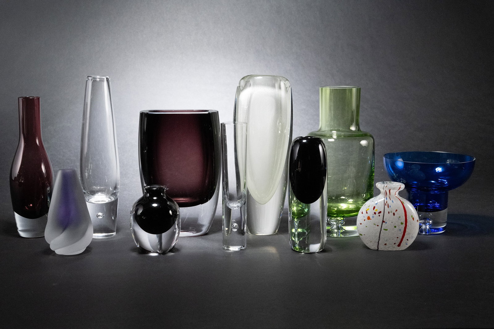 Large Art Glass Collection Lot Signed Illegible: Large Art Glass Lot Assortment of Mid-Century Modern Vases Features: (1x) Steuben Bud Vase With Controlled Bubble in Base Signed Underneath base: " Steuben " 8 1/8" H x Top 2 1/8" W x Base 1 5/8" W x 