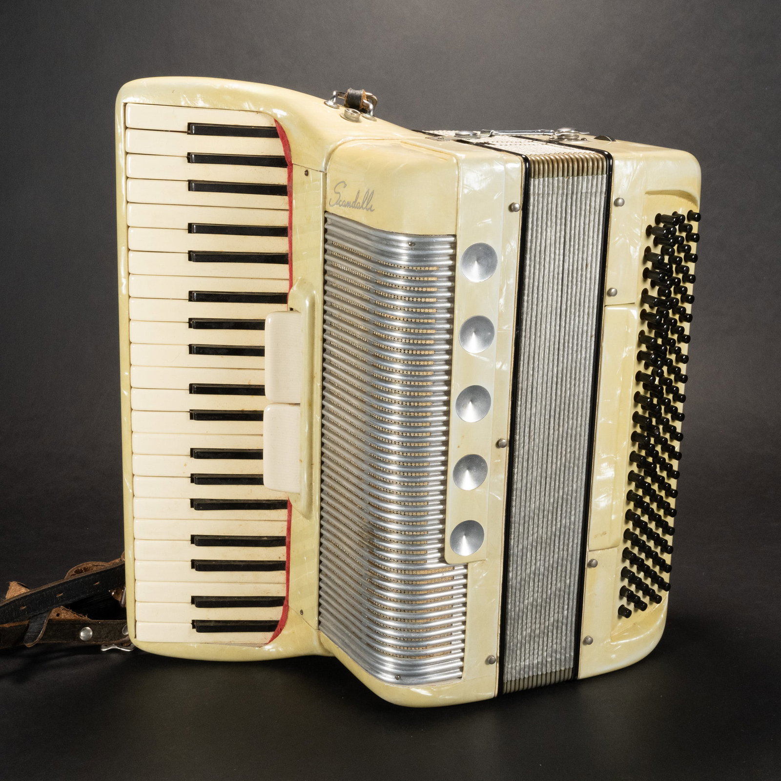 Italian Silvietto Accordion with Case: Italian Made Silvietto Accordion with Carrying Storage Luggage Case Size is 16" across 17" tall and 8" deep. Briefcase size is 21" x 18" and 9" tall Keys and Bellows are in working condition Made in I
