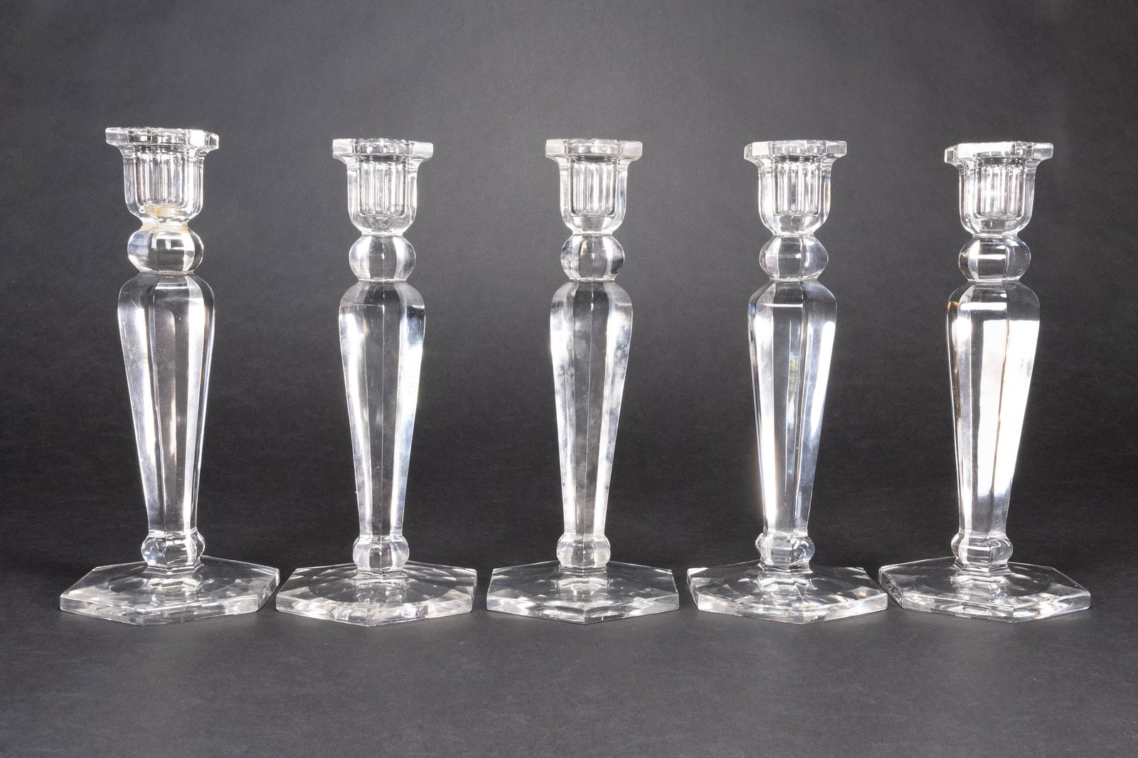 French Baccarat Crystal Glass Candlestick Group: Baccarat Made in France Crystal Candleholder Grouping Lot Art Glass on Hexagonal Form Base One Candleholder is Stamped for all of Them Underneath: "Baccarat France" 10" H x 4" W One Of Candleholders H