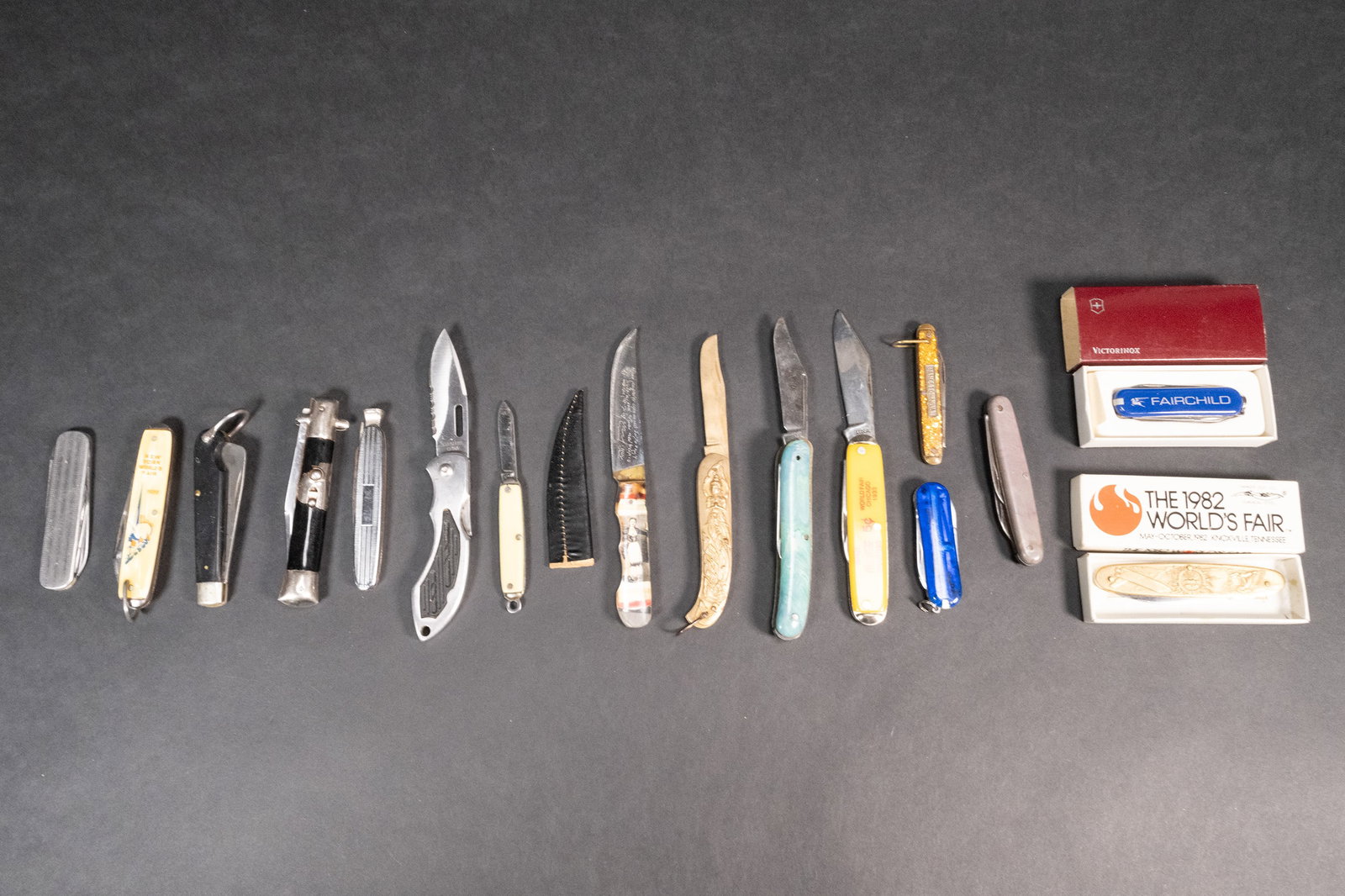 Pocket Knife Collection Worlds Fair Coca-Cola Inox Victorinox Thornton: Pocket Knives Collection Grouping Group Lot 1982 Worlds Fair Pocket Knife In Box 1939 NY Worlds Fair Knife 1933 Chicago Worlds Fair Pocket Knife With Coca Cola Advertising Victorinox Fairchild Knife I