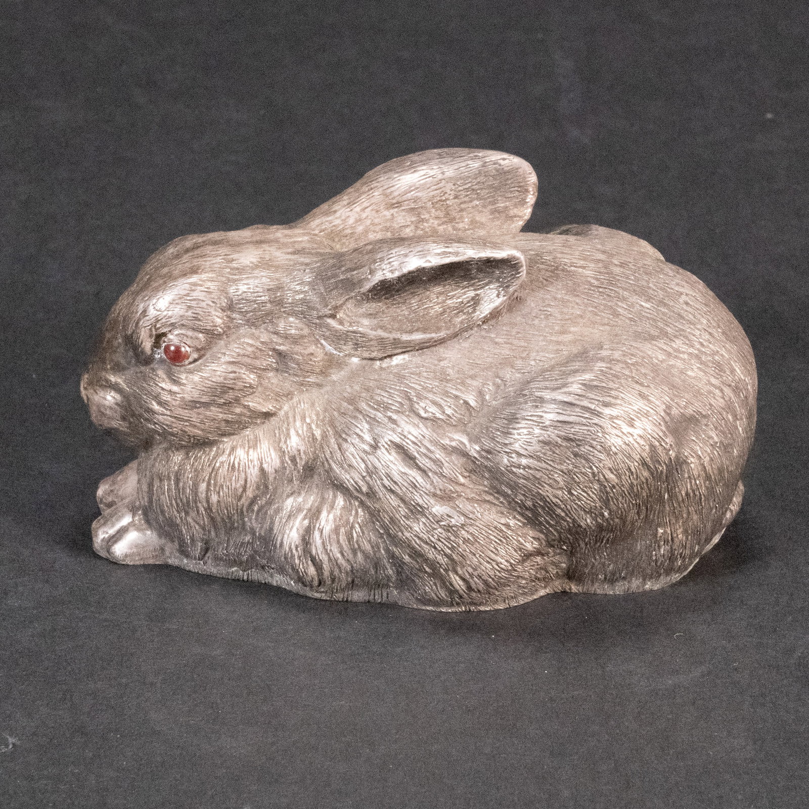 Faberge Russian Silver Rabbit Steven Wakeva: Steven Wakeva ( 1833 - 1910 ) Faberge Russian Silver Rabbit Sculpture with ruby eyes SW artist mark with 88 Sterling Silver Hallmark Size: 4 x 2.5 x 2.25 inches Weight 14ozt In Overall Good Condition 