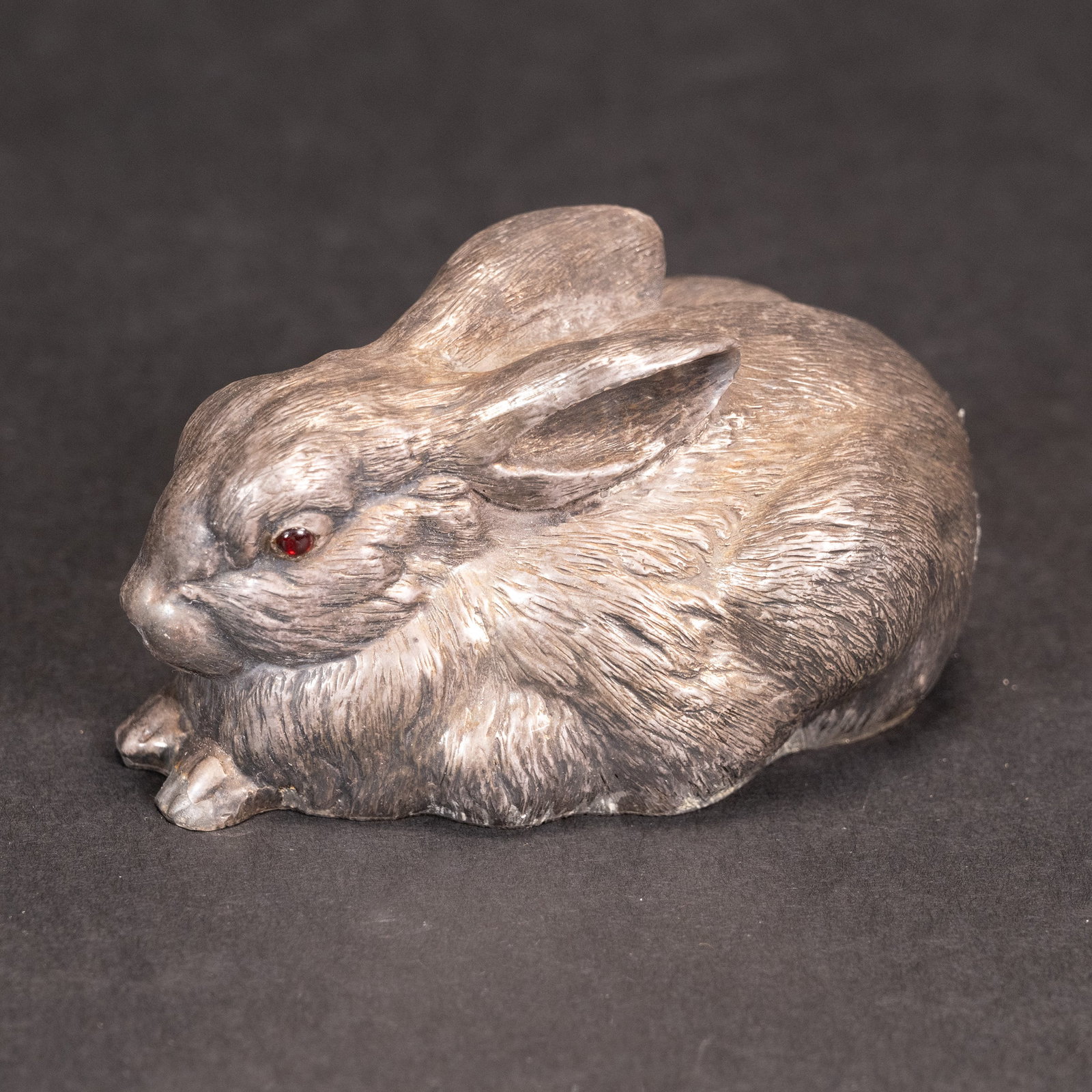Faberge Russian Silver Rabbit Steven Wakeva: Faberge Russian Silver Rabbit Steven Wakeva Heavy Russian silver rabbit figurine with ruby eyes SW artist mark ( Steven Wakeva 1833 - 1910 ) with 88 silver standard mark Size: 4 x 2.5 x 2.25 inches. W