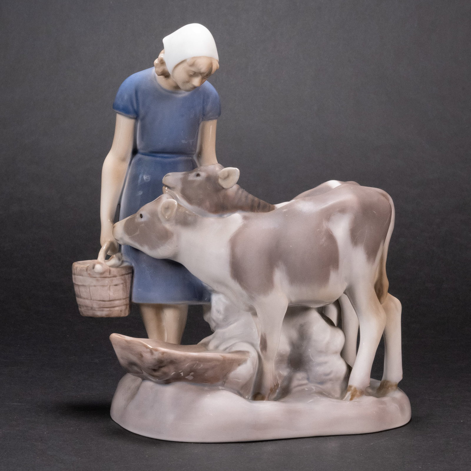 Royal Copenhagen Sculpture "Girl and Two Calves": 20th Century B&G Bing & Grondahl Figurine " Girl and Two Calves Cows" Impressed Axel Locher Numbered 2270 Made in Denmark Danish Modern 8 1/4" Tall x 7" Across In Overall Good Condition Please look at