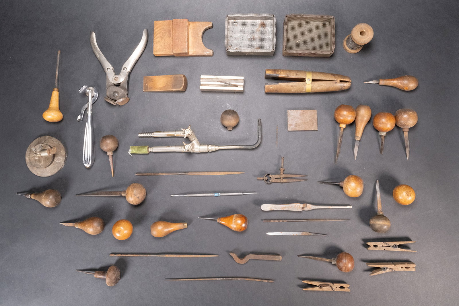 Vintage Antique Jeweler Tools Gravers Finger Ring Cutters Group Lot: Vintage Antique Jewelers Tool Graver Finger Ring Cutter Oxygen Gas Torch Handle Clamping And holding Tools Cutters Bins With Mesh Jewelry Repair Tools and Much More Supplies In Overall Good Condition 