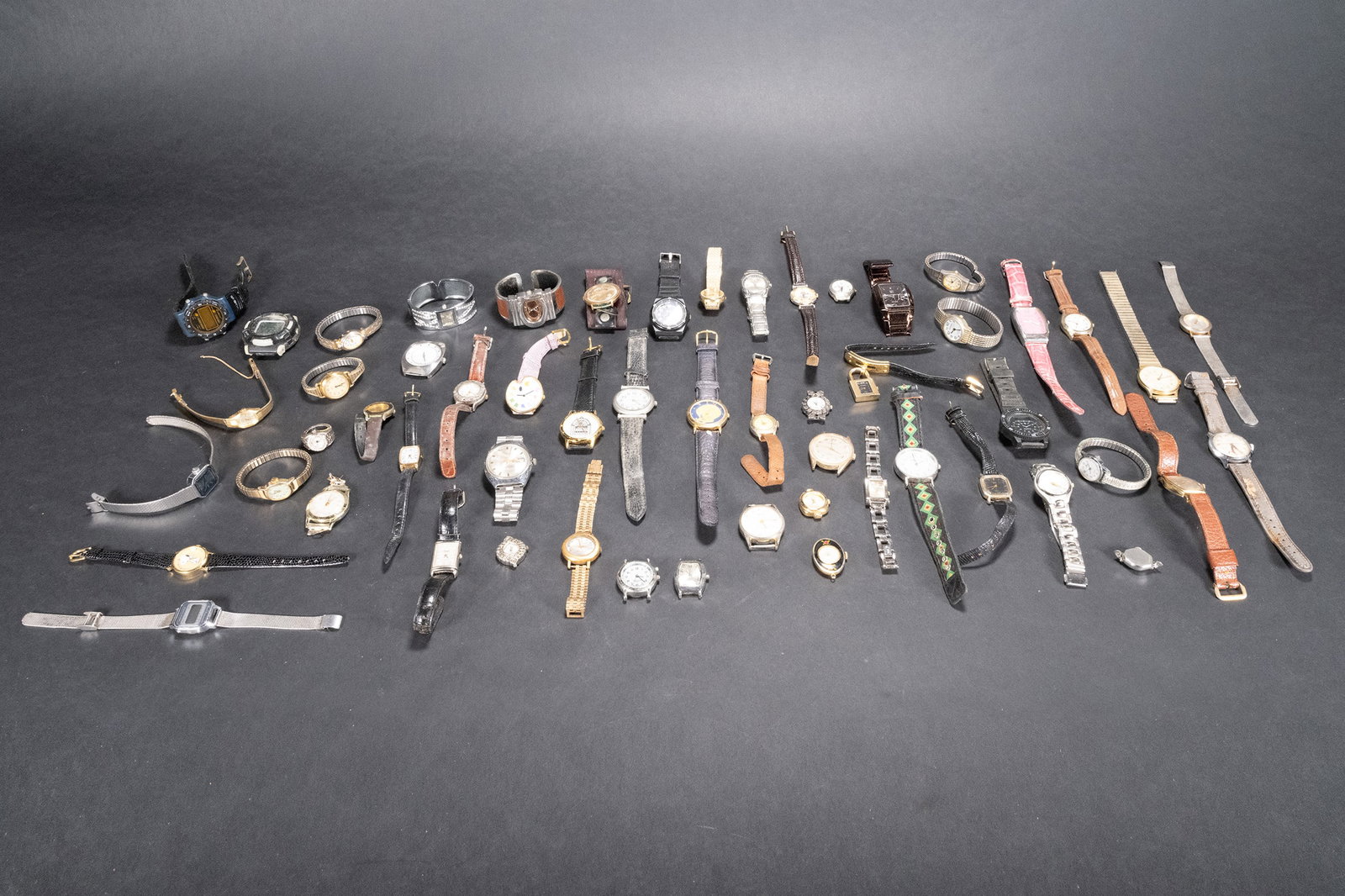 Vintage Lot Over 50 Wrist Watches: Vintage Lot of Over 50 Wristwatches Sport Casual Dress Leather and Metal Bands Collection of Various Brand Models Lot Contain Watches From Companies Such As Timex Geneva Charles Raymond Cipriani Eicar
