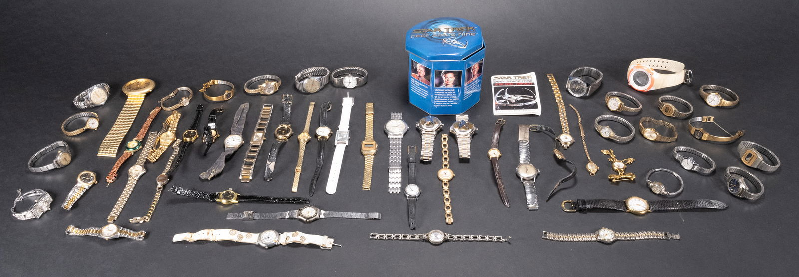 Vintage Lot Over 50 Wrist Watches: Vintage Lot of Over 50 Wristwatches Quartz Sport Casual Dress Leather and Metal Bands Collection of Various Brand Models Lot Contain Watches From Companies Such As: Bulova Guess Timex Welsbro Prestige