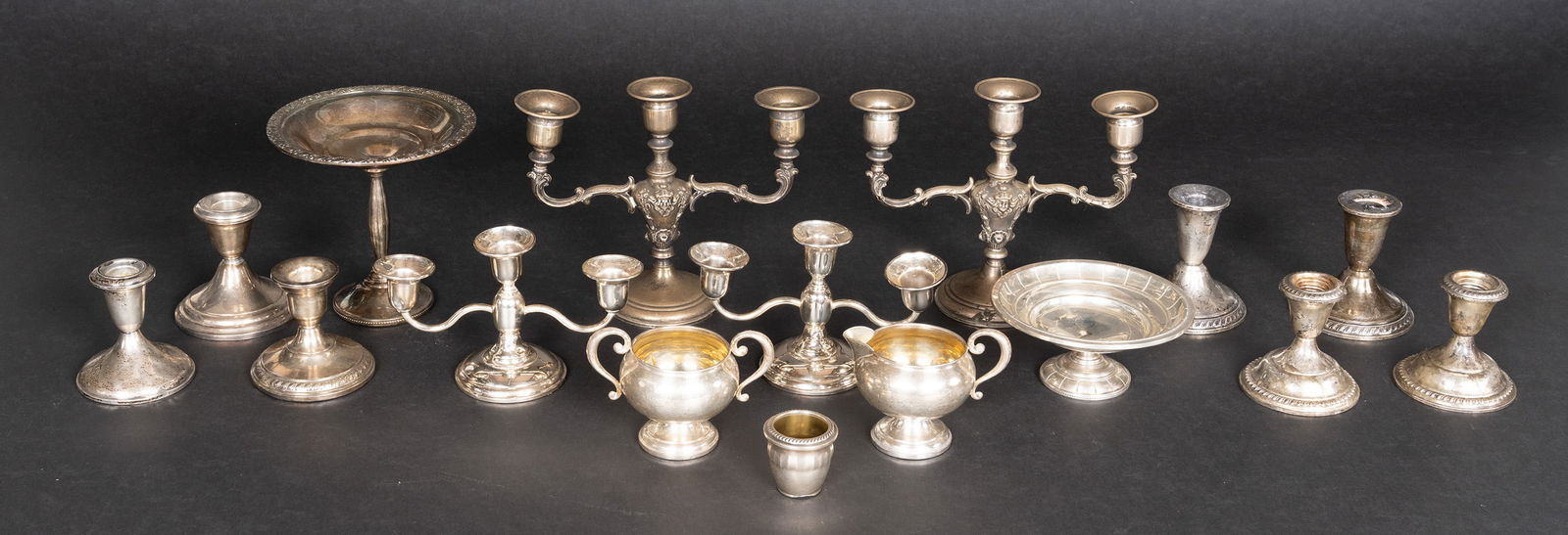 Sterling Silver Tableware Collection Group Lot: Sterling Silver Tableware Barware Lot (1) Pair of Vintage 3 Canlde Candlelabra Candlesticks Ornate With Faces Each 7" Tall 9" Wide with a 3.5" Circular Base Marked Garden Silversmiths Sterling Weighte