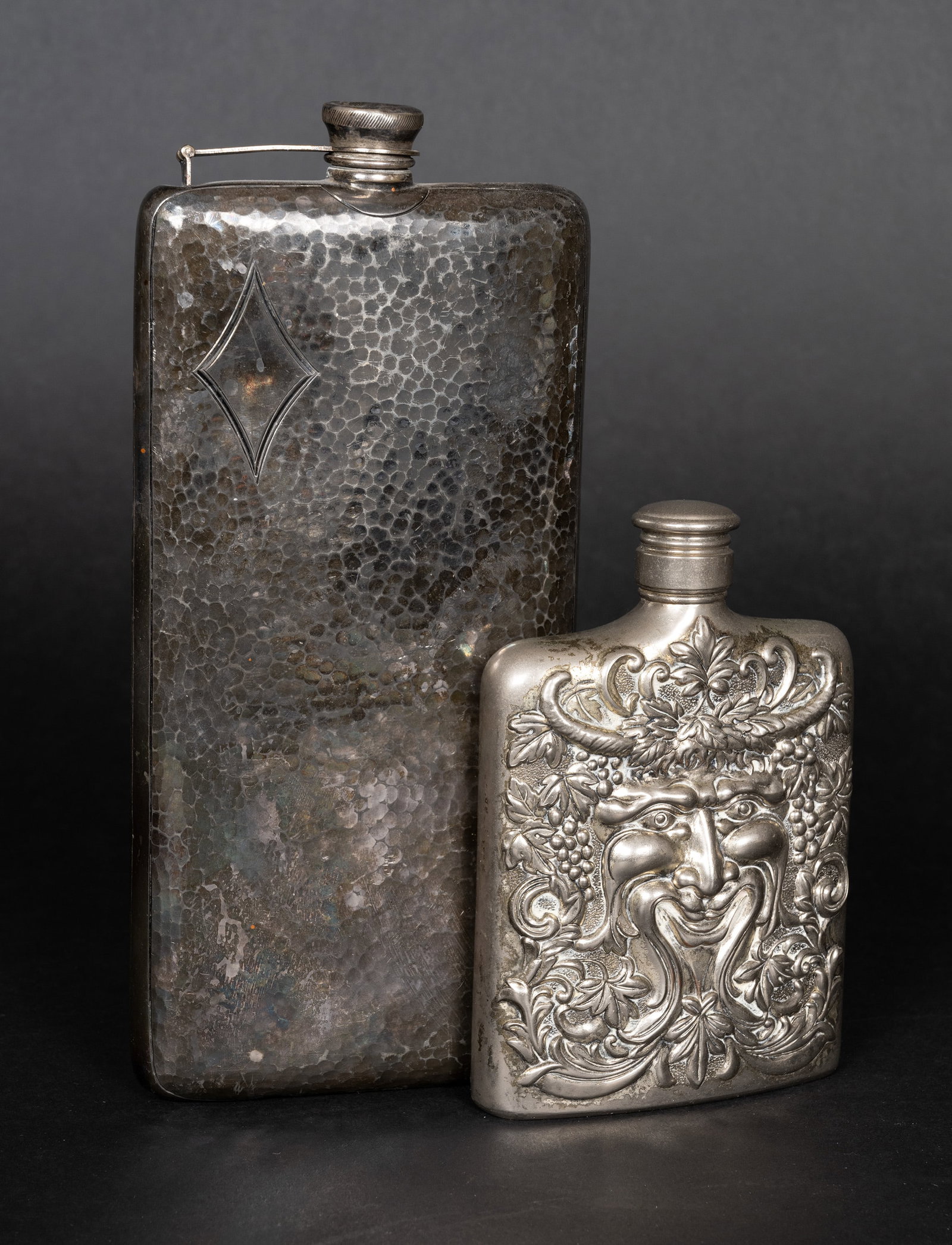 Silver Plated Whiskey Liquor Flasks Bacchus Gottinger: Silver Plated Whiskey Liquor Flasks Bacchus Gottinger (1) Godinger Silver Plated Bacchus Flask A Vintage Godinger Silver Plated Flask With a Frontal Repousse Motif with a Male Face Representing Bacchu