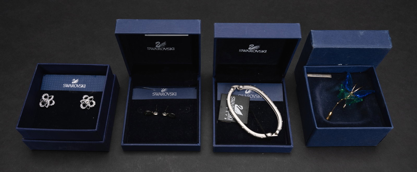 Vintage Swarovski Jewelery Collection: Vintage Swarovski Jewelery Collection Featuring (1x) Mini Crystal Bangle Bracelet Silver in Color with Crystals surrounding the Entire Bracelet Hindged Hardware and Latch 2-3/8" x 1.5" With Box and or