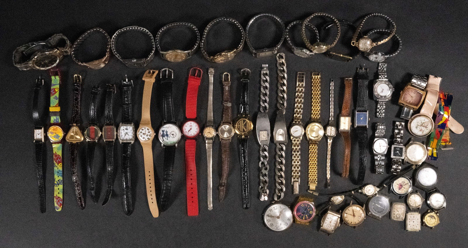 Large Vintage Wristwatch Lot: Large Vintage Wrist Watch Lot of Over 50 Wristwatches Sport Casual Dress Leather and Stainless Steel Band Collection Various Brand Model Lot Contain Watches From Companies Such As: Swatch Bulova Timex