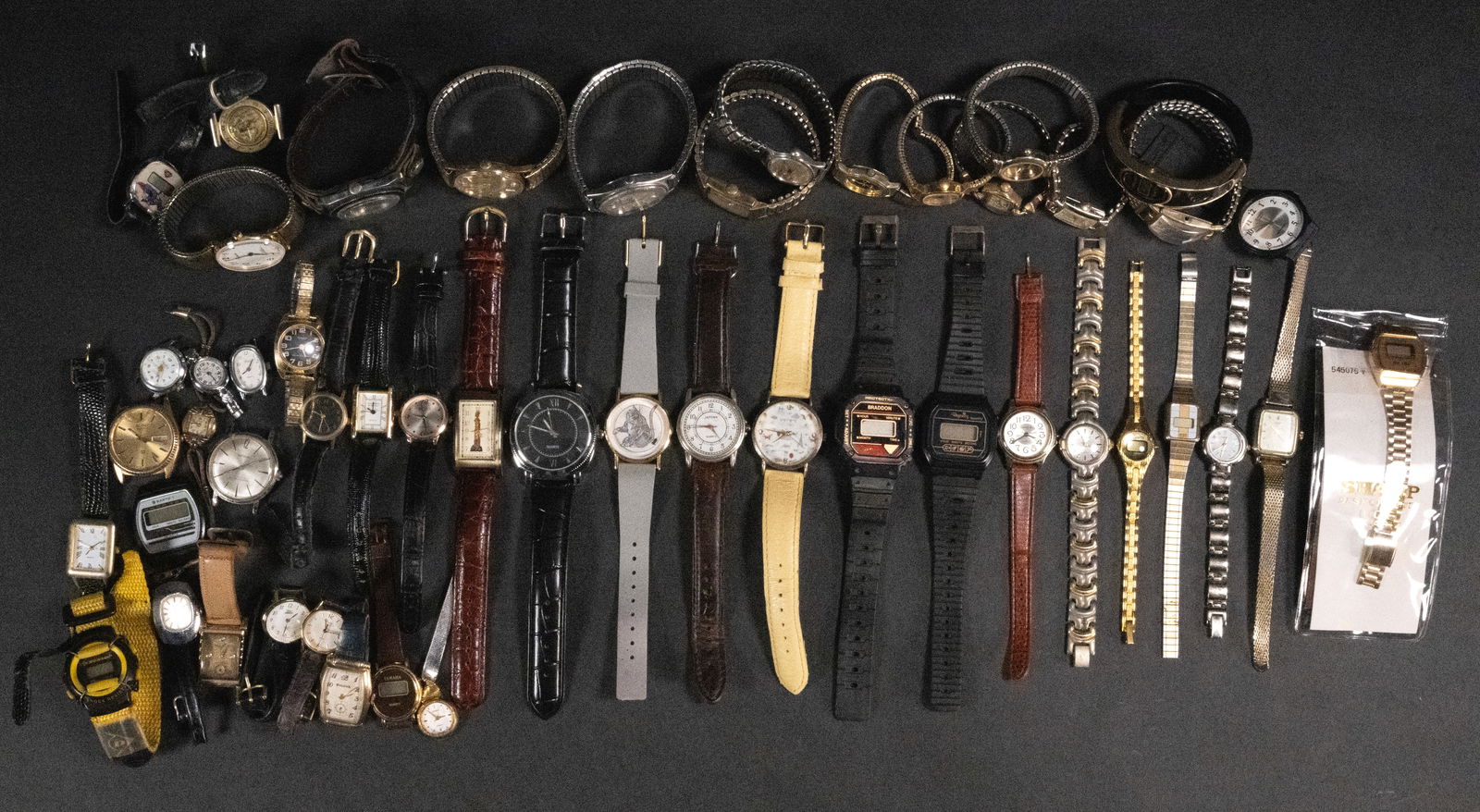 Large Vintage Wristwatch Lot: Large Vintage Wrist Watch Lot of Over 50 Wristwatches Sport Casual Dress Leather and Stainless Steel Band Collection Various Brand Model Lot Contain Watches From Companies Such As: Gruen Benrus Geneva