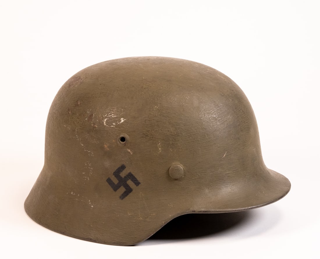WWII German Luftwaffe M35 EF66 Dual Decal Helmet: WW2 German Luftwaffe M35 EF66 Double Decal military combat helmet All three of the liner retaining rivets are intact. The interior of the helmet is Absent neck guard apron has a faint stamp serial / l