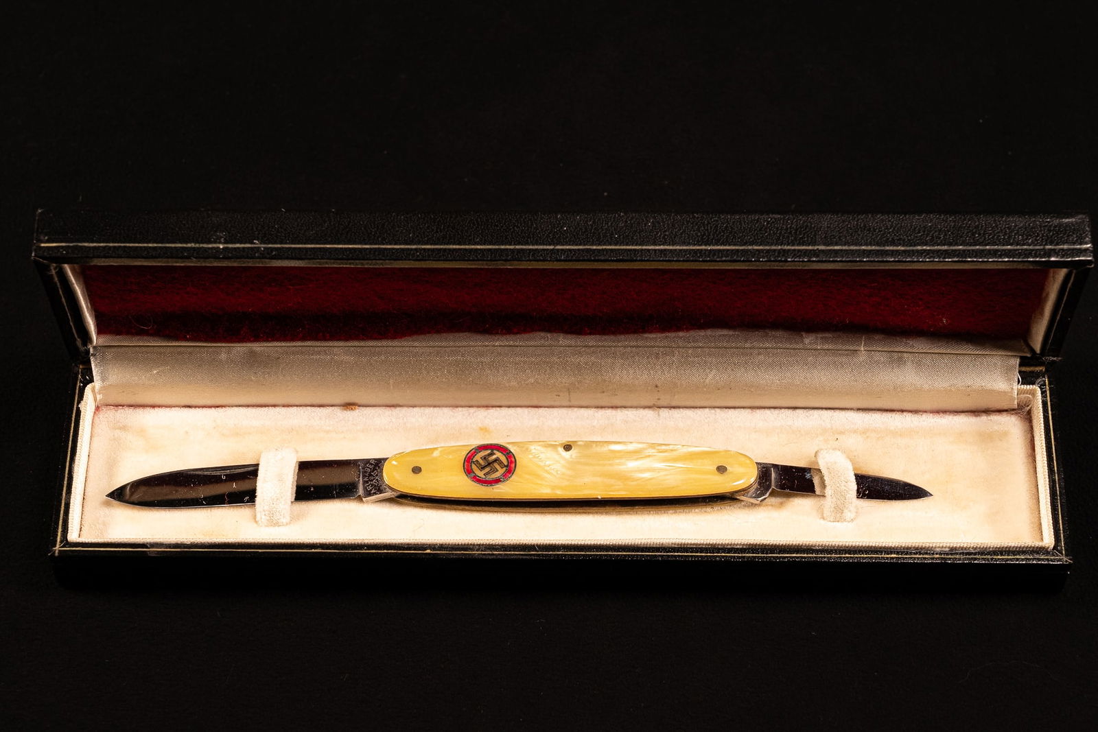 WWII German SS Pocket Knife by Carl Radar Solingen: WWII German Waffen SS Pocket Knife Made by Carl Radar Solingen Germany Double Dual Blade Mother of Pearl Handle Encircled Swastika Near Larger Blade Marked Carl Radar Solingen In Overall good conditio