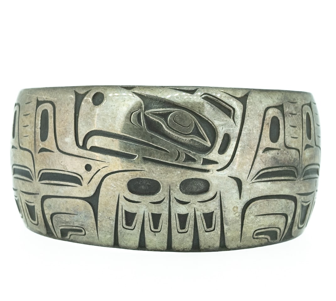 Barry Herem Native American Northwest Sterling Silver Cuff Bracelet: Barry Herem Native American Indian Northwestern Sterling Silver Cuff Bracelet Wide heavy Raven's Head Totem Incised Cuff Hallmark to Interior: "Barry Herem Sterling" Approx: Exterior: 3"L 2 1/4"W Face