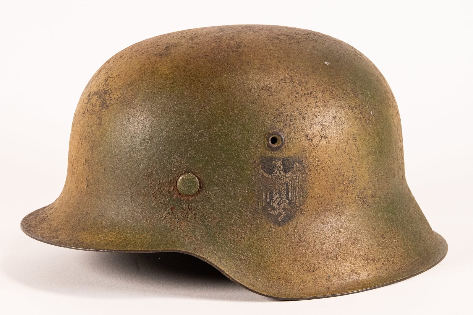 WWII German Army M42 Single Decal Normandy Camo Combat Helmet: WW2 Nazi Germany Wehrmacht Army M-42 Single Decal Normandy Camouflage Combat Helmet & M-40 Chicken Wire Camouflage Combat Helmet. Model M-42 Helmet Painted in Tones of Tans, Greens & Reds. German Eagl