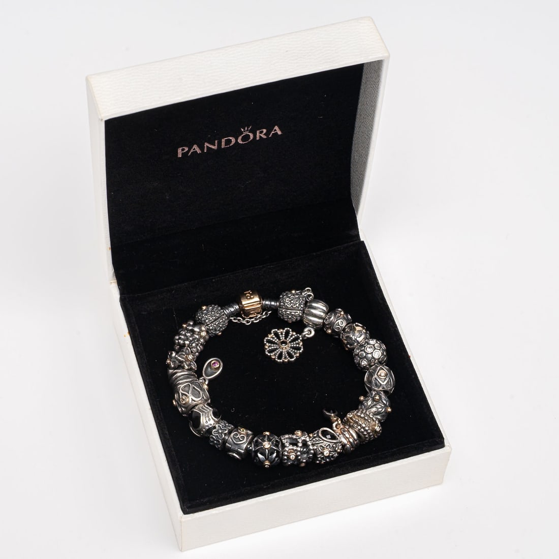 14k Gold Diamond Sterling Silver Pandora Multi Charm Bracelet 20 Charms: 14kt Yellow Gold Diamond 925 Sterling Silver Pandora Multi Charm Bracelet Featuring 20 Charms Presented in Original White Signed Gift Presentation Case Includes Safety Chain Connecting Two Charms Seve