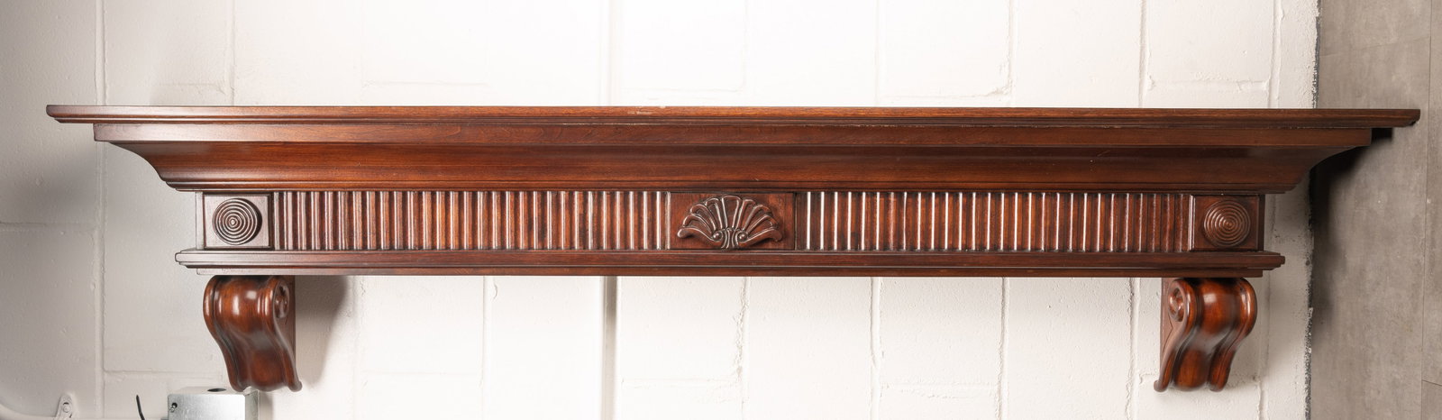 Cherry Wooden Fireplace Mantel 6 Feet: Distressed Cherry Fireplace Mantel 6 Foot Carved Hand Finished Graceful Corbels Rosettes and Reeded Moldings with a Pearl Inlay Inlaid to Right Side Dimensions Approx: 72"L 10"W 17 1/4"H We Provide Ef