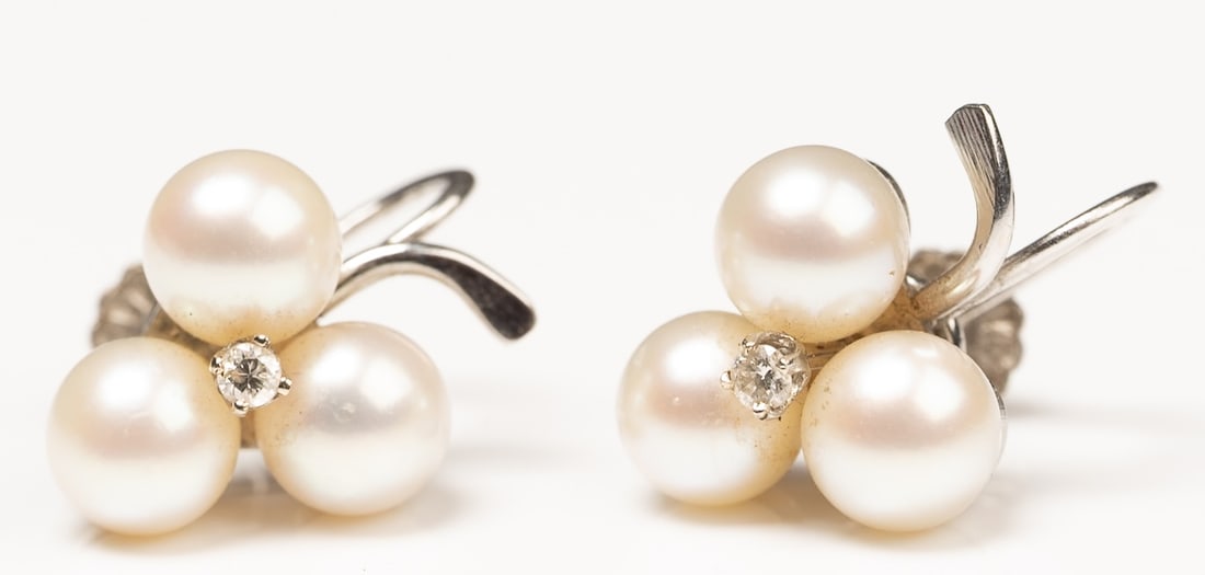14k Gold Pearls & Diamond Floral Vintage 1940's Screw Back Earrings Pair: 14K White Gold Pearls & Diamond Vintage 1940's Screw Back Earrings Pair in a Floral Cluster Design with Three Pearls and Genuine Tested Prong Set Diamond to Center Each Hallmarked to Post: " 14KT "