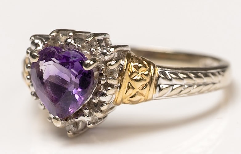 14K Gold Diamonds & Amethyst Heart Shaped Ring: 14K White and Yellow Gold Diamonds & Amethyst Heart Shaped Love Ring Featuring High Quality Heart Shaped Faceted Amethyst Gemstone in Prong Setting Surrounded in Halo of 7 Genuine Tested Prong Set