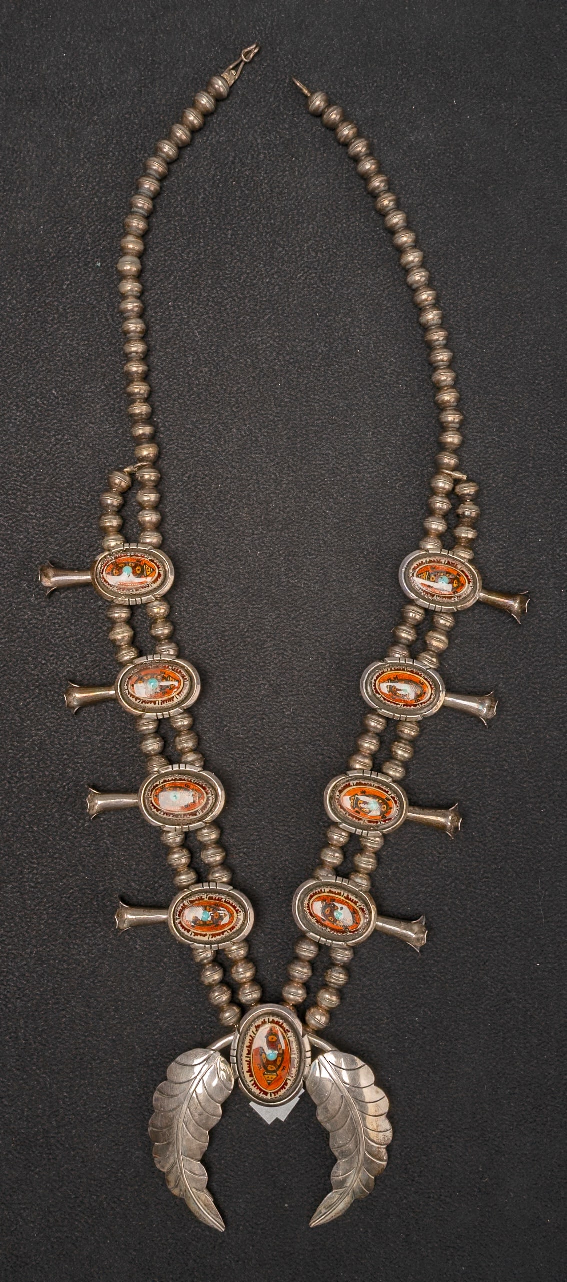 Eddie Secatero Navajo Hand Painted Coral Turtle Spirit Animal Squash Blossom Sterling Silver: Eddie Secatero Navajo Tribe Hand Painted white Coral Spirit Animal Turtle Squash Blossom Sterling Silver Necklace Hand Crafted Featuring a Central Large Crescent Horseshoe Shaped Naja Pendant with Det