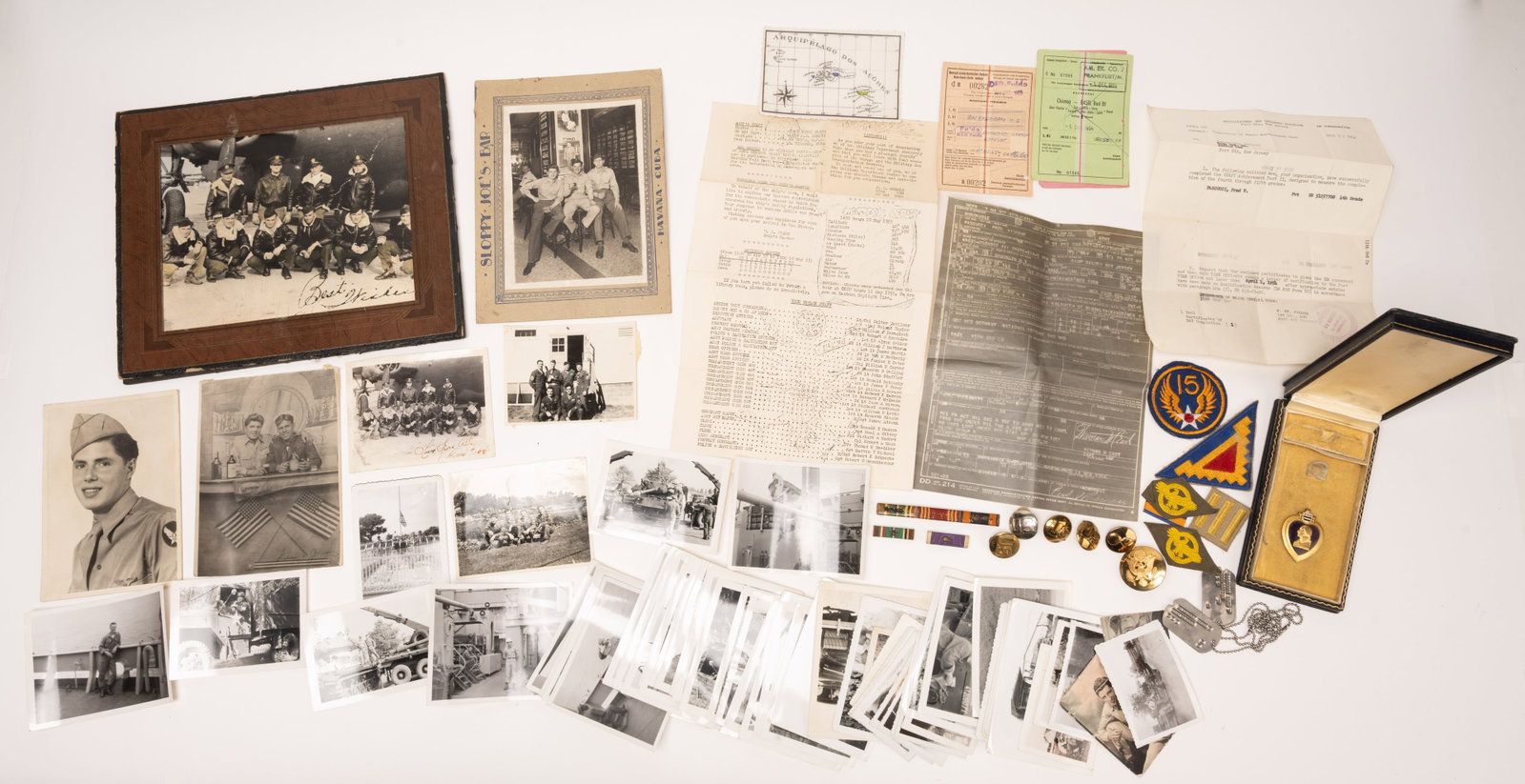Lg WWII US American Collection Fully Identified B24 Bomber Crew Photos Purple Heart: Extensive World War II Era United States Military Grouping Featuring B-24 Bomber Crew Photographs Medals Insignia and Ephemera Centered around a Striking Framed and Matching Loose Photograph of a B-24