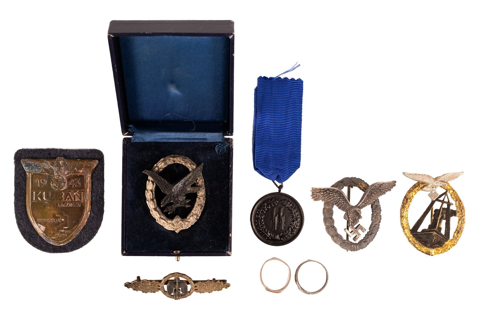 WWII German Luftwaffe Air Force Order Badge Medal Insignia Collection: WWII Germany Militaria Luftwaffe Badge Medal Insignia Collection Including Luftwaffe Radio Operator Aerial Gunner Badge with Box Featuring a Diving Eagle with Lightning Bolts Surrounded by an Oak Leaf