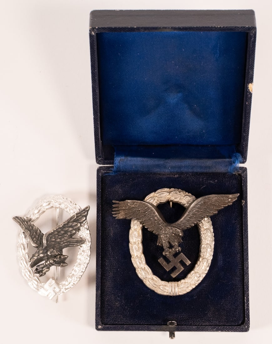 WWII German Luftwaffe Medal Insignia Collection JMME / JUNKER: WWII German Luftwaffe Medal Insignia Lot of (2X) Examples Including (1X) Pilot Badge with Presentation Box Maker Marked "JMME" Featuring Flying Eagle Clutching a Swastika within an Oval Oak Leaf Wreat