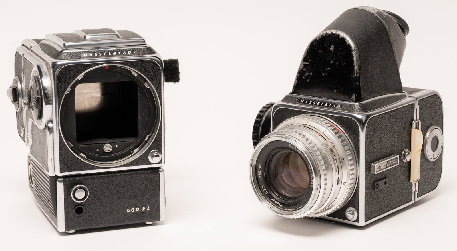 Hasselblad 500C and 500 EL Medium Format Camera Outfit With Carl Zeiss Planar Lens: Hasselblad Medium Format Camera Group Including 500C Manual Body with Angled Prism Viewfinder Carl Zeiss Planar 80Mm F/28 Lens Serial Number 4490884 with Synchro-Compur Leaf Shutter and Attached 24-Ex