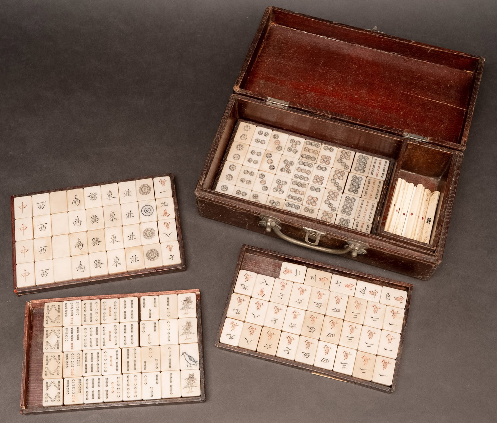 Chinese Bone & Bamboo Mahjong Set w/ Hand Carved Tiles Betting Sticks etc: Chinese Bone and Bamboo Mahjong Set with Hand Carved Tiles Und Betting Sticks the Complete Set Features Finely Constructed Bone Front and Bamboo Backed Tiles Each Hand Carved with Traditional Chinese 