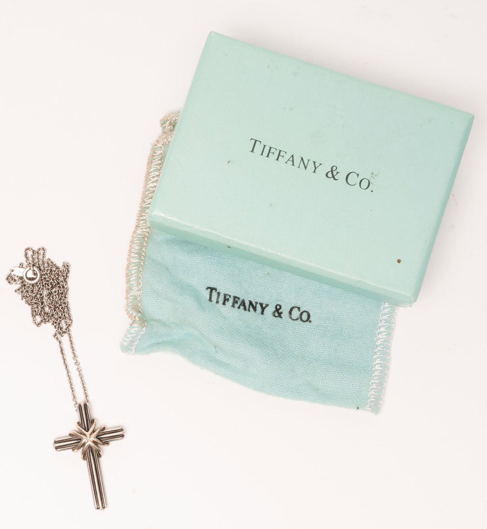 Tiffany & Co 18k Gold Signature Cross Necklace: Tiffany & Co 18k Gold and Sterling Silver Signature Cross Necklace Complete with Its Original Signed Anti-Tarnish Storage Cloth Dust Bag and Iconic Tiffany Blue Presentation Box Features the Classic L