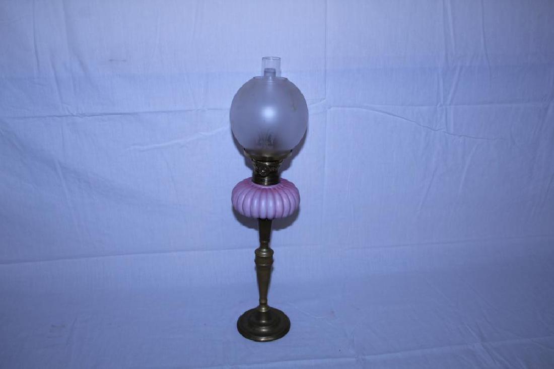 Beautiful miniature gone with the wind oil lamp with: This oil lamp measures 19" tall overall. 5 ¾ " long chimney. This appears to be in perfect condition with no damage or repairs. See all photos for full details. Thank you and good luck