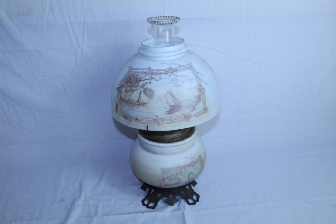 Painted gone with the wind lamp: This beautiful lamp has a painted top and base. This is in very good condition with no damage or repairs. Measures 18 ¾ " with chimney x base is 6" x 6" and displays beautifully. Could use to be clea