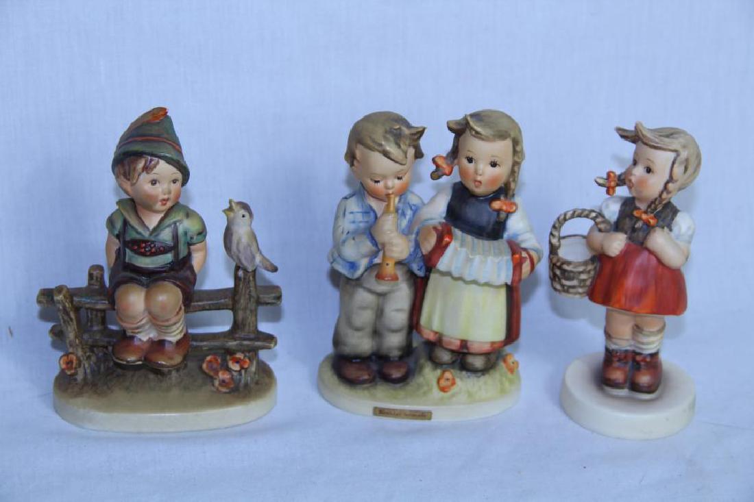 Three hummel figurines (1 of 11)