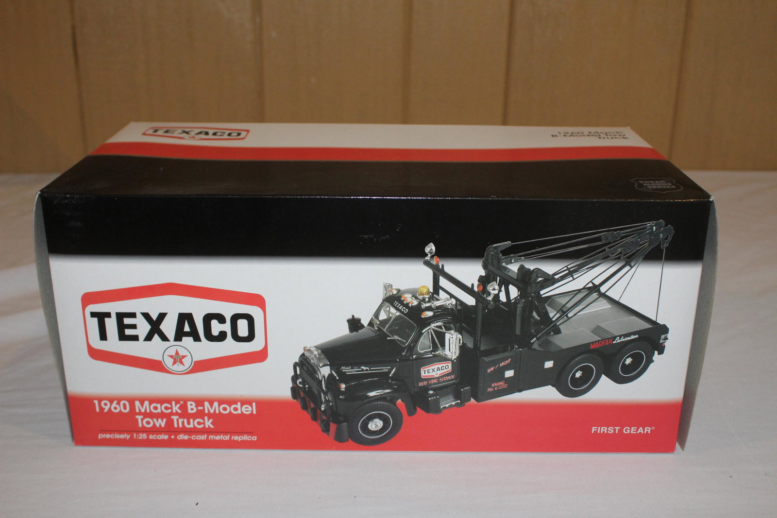 First gear Texaco 1960 Mack B-Model Tow Truck #49-0012: This has the original box and foam packaging. Item is in like new condition, appears unused. 1:25 scale die cast replica. Complete and would add to any shop, collection or home. See photos.