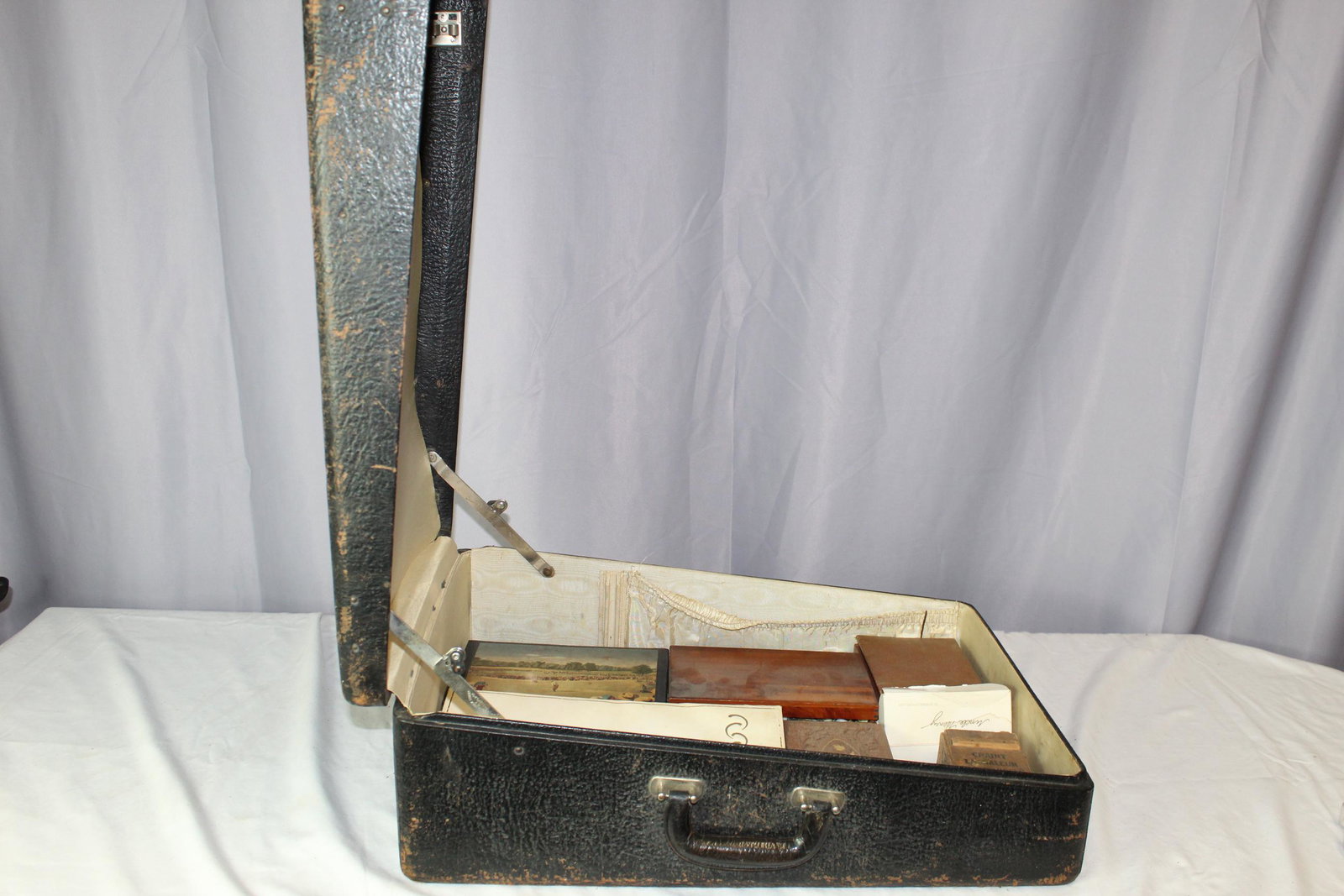 Vintage suitcase filled with boxes of buttons (1 of 12)