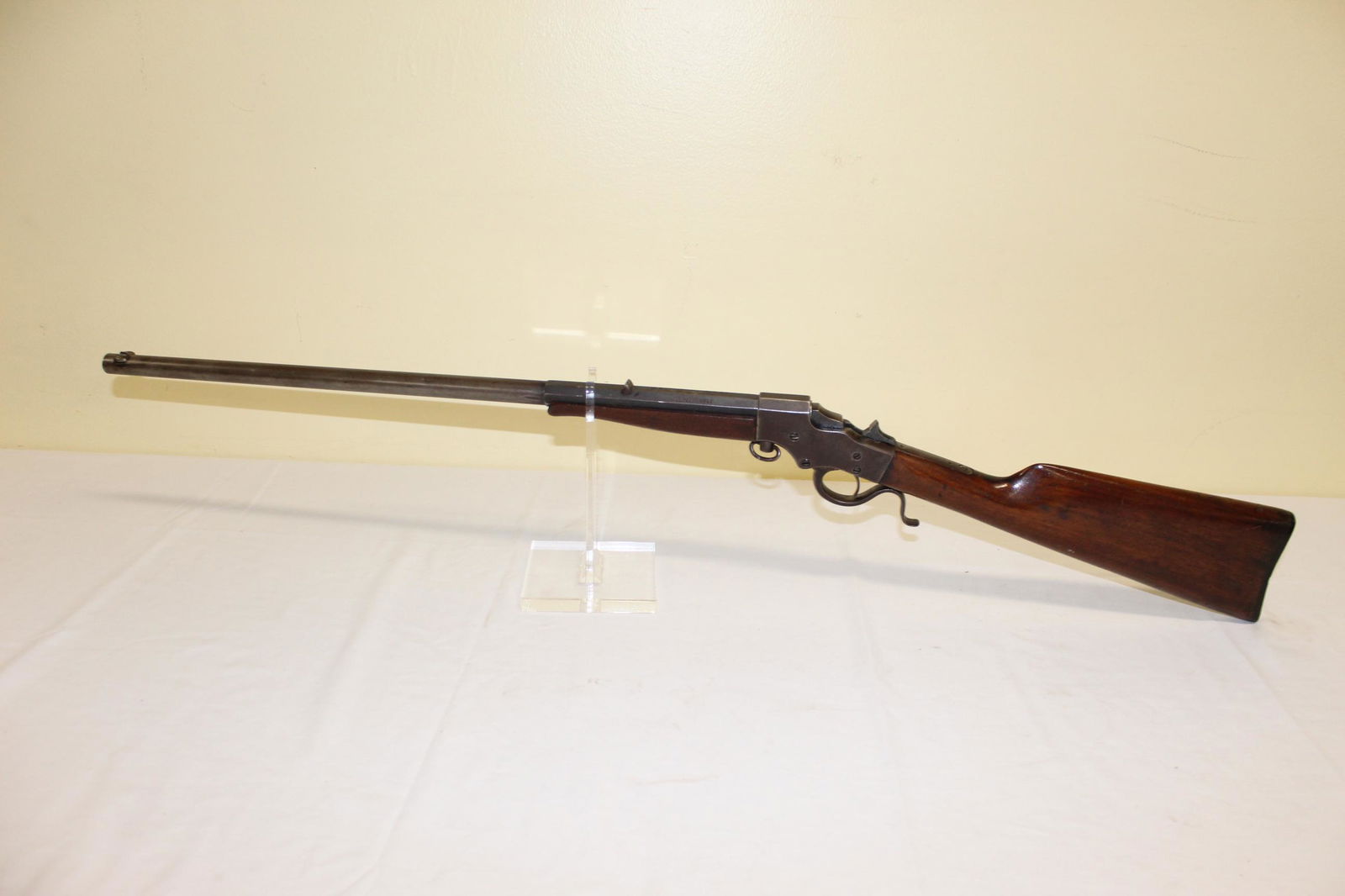Antique J. Stevens A & T Co. 22 caliber long rifle: This antique gun feels like the trigger has a spring broken. 22 long rifle caliber. There is a N 86 marked below the trigger. Some scuffs on the barrel otherwise no damage or repairs seen. See all pho
