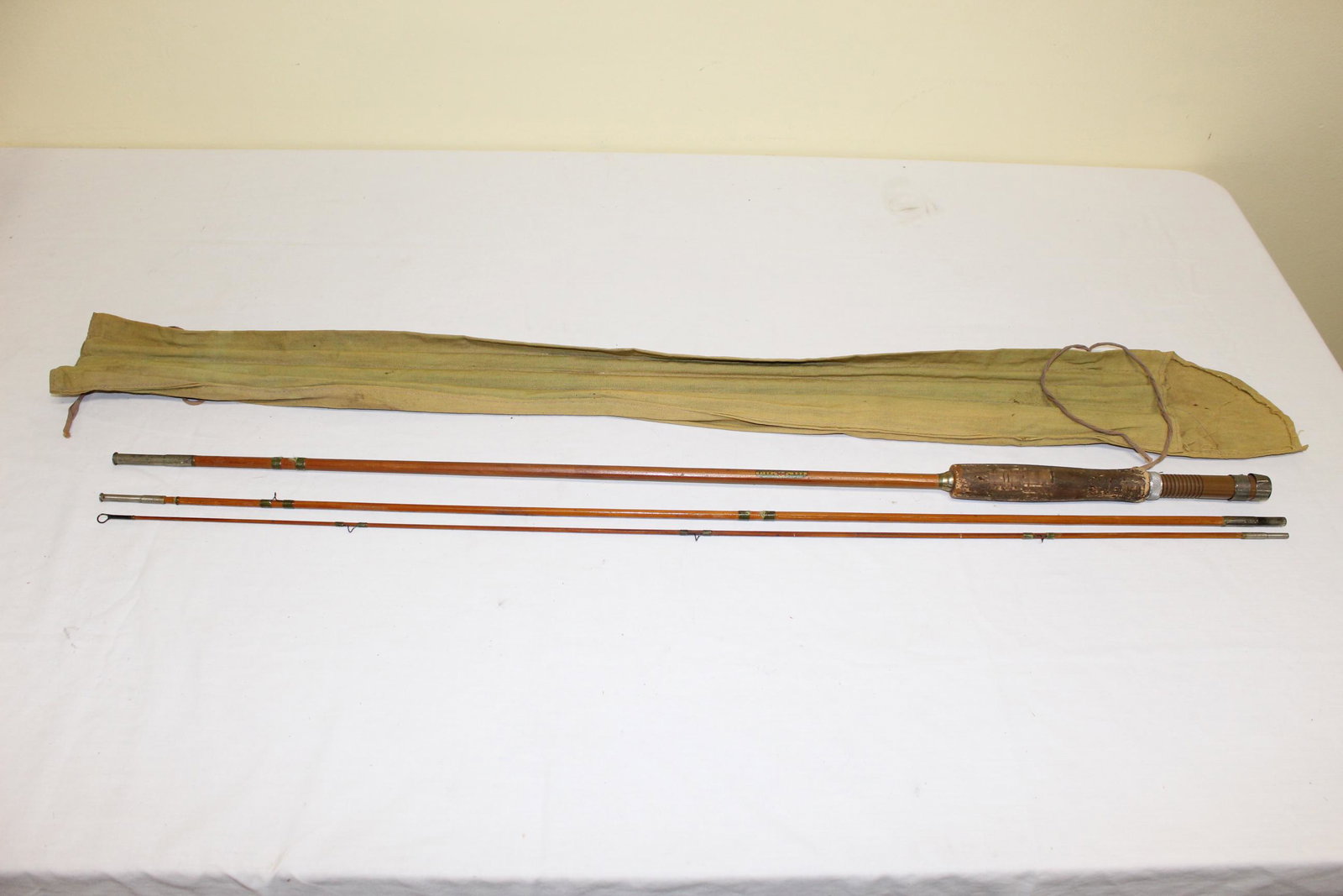Genuine tonkin cane H-I fish rod in cloth glove: This nice fish rod is 3pc and the pieces measure about 34.5in L overall. This is marked on the cane Genuine Tonkin Cane Fish Rod H-I Horrocks Ibbotson Co. Utica NY made in USA. Overall in great condit