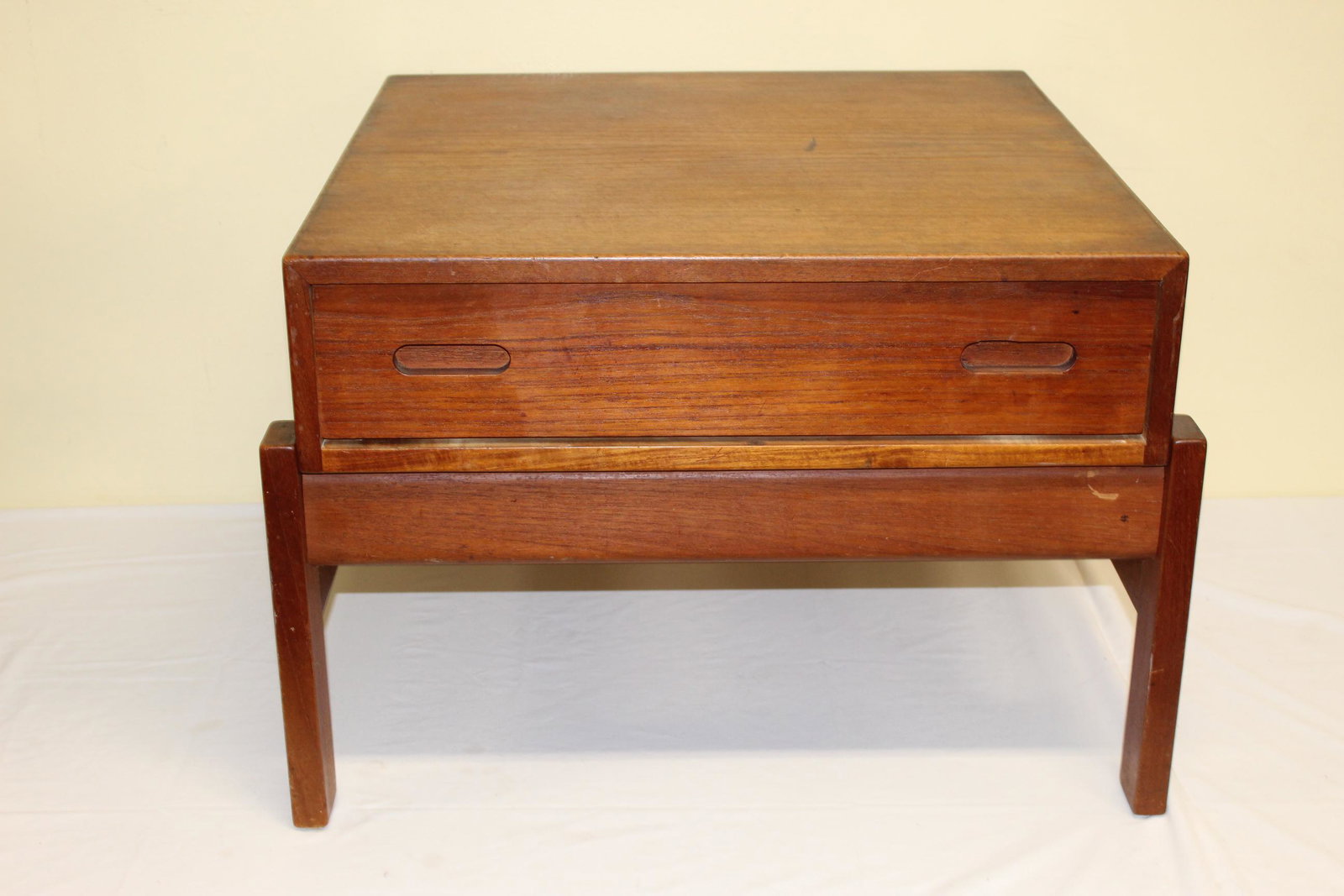 One draw two piece Danish end table: This measures 17in T x on top 23in x 23.25in overall. This sits on a teak wood frame and has a great look to it. The draw has divided compartments inside. These were bought at the same time as the pri