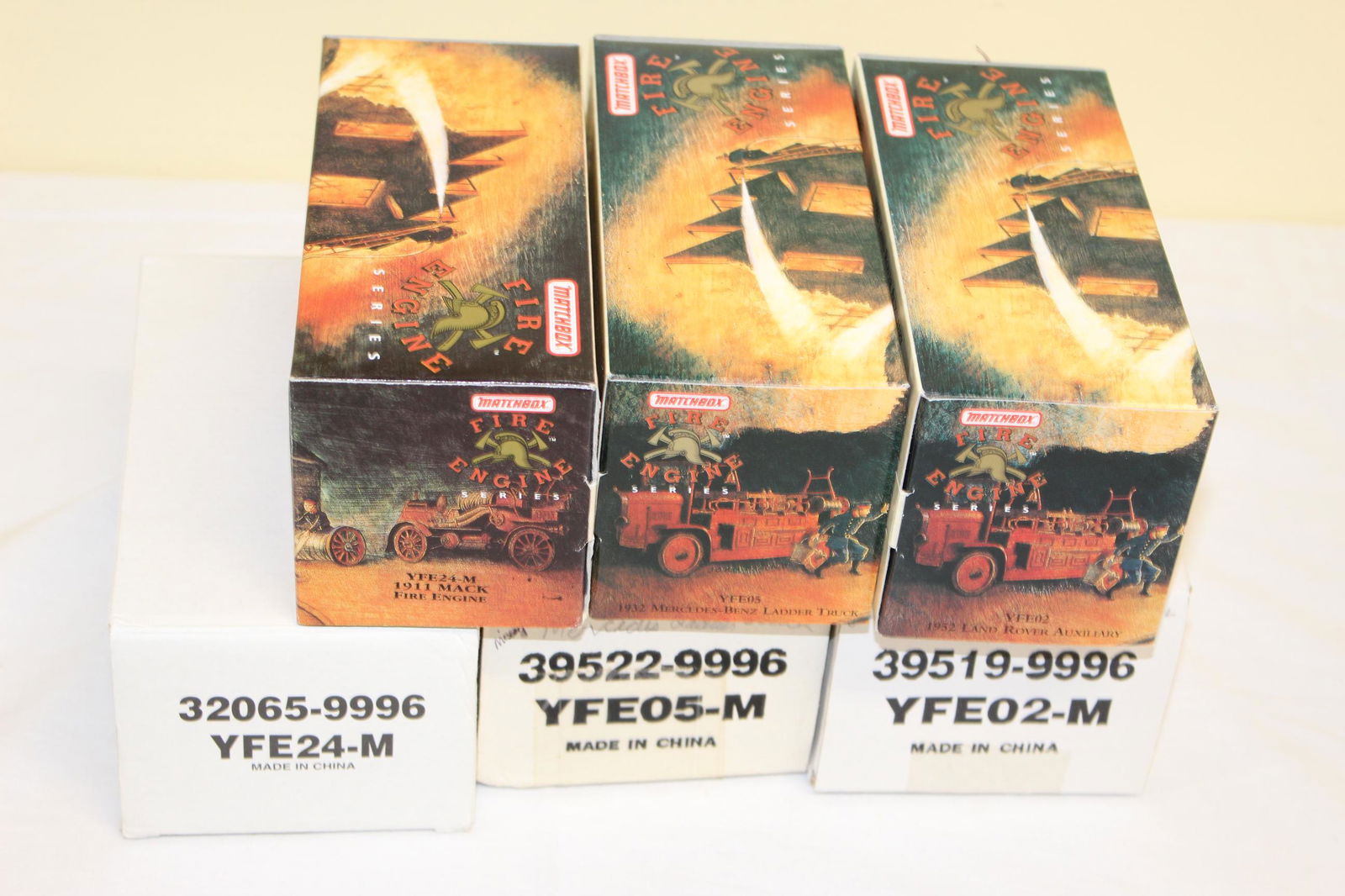 Lot of Matchbox fire engine collectibles: These all comes in there original boxes and packaging. Like new condition. Include; YFE02 1952 Land Rover Auxiliary, YFE05 1932 Mercedes-Benz ladder truck, and YFE24-M 1911 Mack Fire Engine. See all p