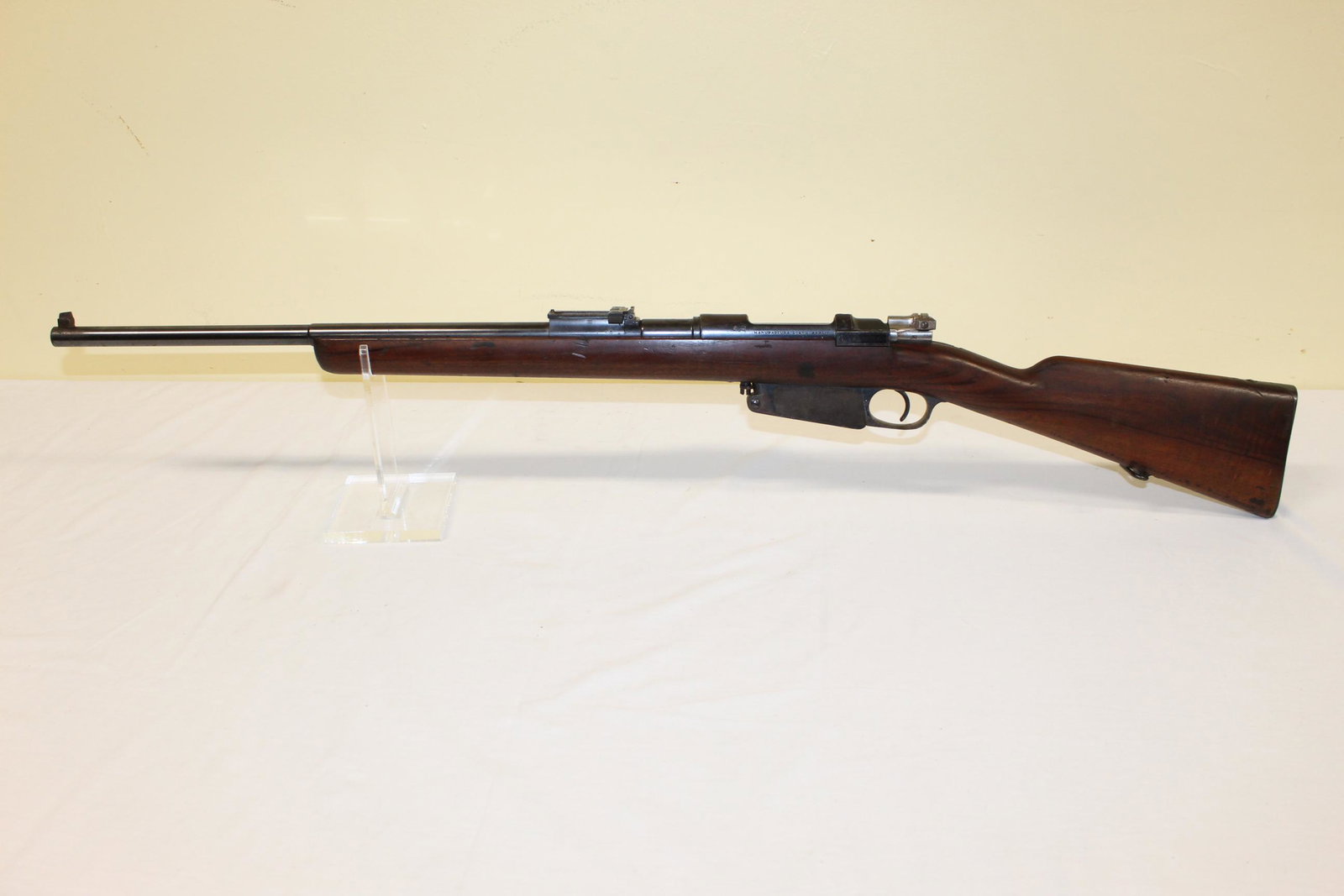Mauser mod. Argentino 1891 Rifle: This nice gun reads Mauser modelo Argentino 1891 manufactura Loewe Berlin. Barrel length is 21.5in overall. Serial number: G2608. 8 mm caliber. Normal nicks and scratches here and there otherwise in g