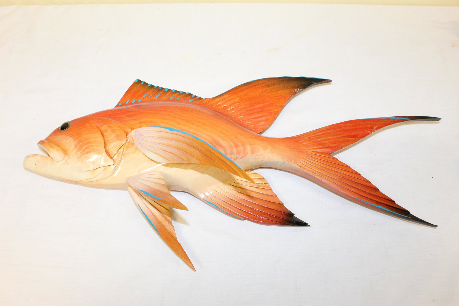 Frank Gabriel carved and painted squirrel fish: This beautiful carved and painted fish is marked Frank Gabriel on the back as well as signed. There are two fins that attache with pegs, one fin as most the peg stuck inside the fish and this fin woul