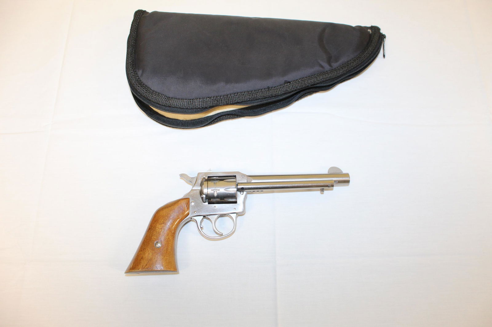 H & R Mod. 950 22 LR Revolver: This beautiful gun has a serial number of AX122087. 22 LR barrel measures 5in L overall. Model 950. no damage or repairs seen. See all photos for more detail. We are FFL licensed dealers, whoever purc