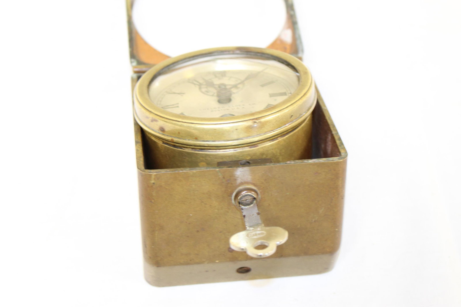 Brass Chelsea ships clock Boston USA: This nice vintage Chelsea ships clock comes with original key. The front clock has a small crack in it otherwise this appears in good overall condition. Face of the clock reads Chelsea Clock Co. Bosto