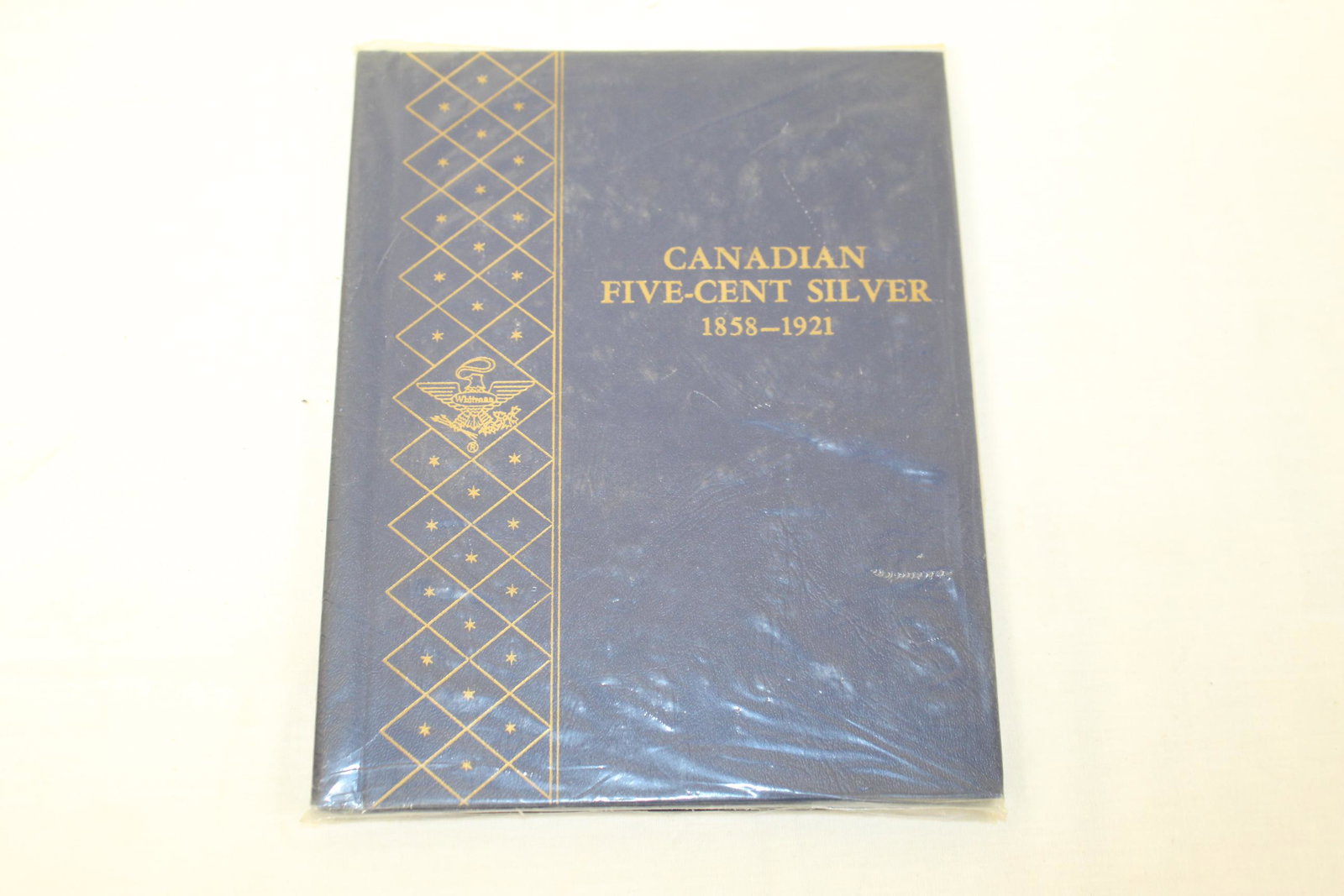 Book of Canadian five-cent silver coins 1858-1921: This book includes 15 coins. Dated: 1880-H, 1881-H, 1882-H, 1899, 1903, 1903-H, 1904, 1905, 1907, George V 1910-1936 Obverse, 1912, 1913, 1917, 1918, 1919, 1920. These are in good overall condition. S