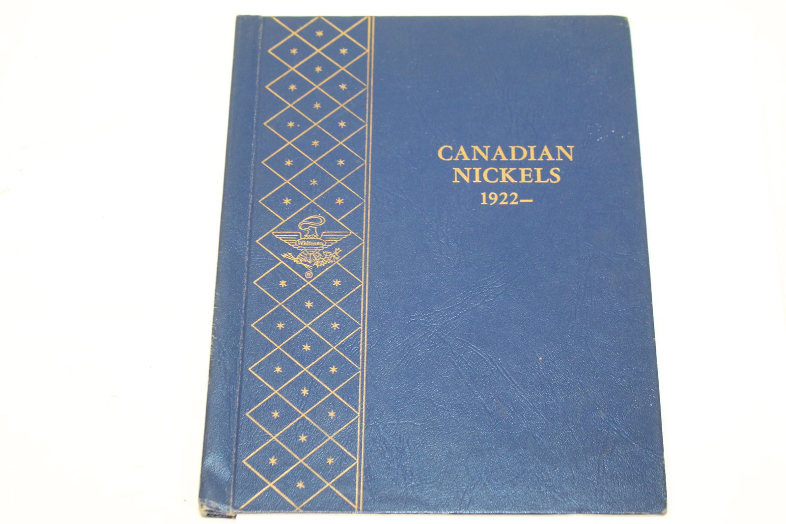 Book of Canadian nickels 1922-: This book includes about 48 coins. These are dated: George V 1910-1936, 1922-1924, 1926 near 6, 1927-1936, George VI 1936-1952 obverse, 1937-1942, 1942 tombac, 1943-1947, 1947 maple leaf, 1948, 1949, 