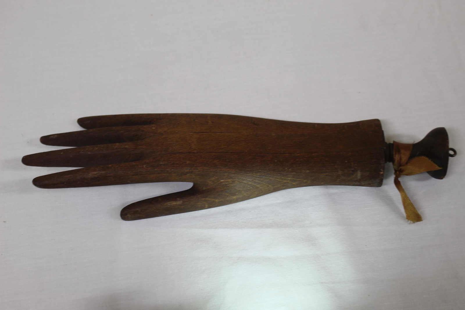 Folk art carved hand: This wonderful all wood carved hand measures 12.5in L overall. This hand was made in three pieces and dovetails together. Hung on the wall and has hook on the bottom to hang again if wanted. This was 