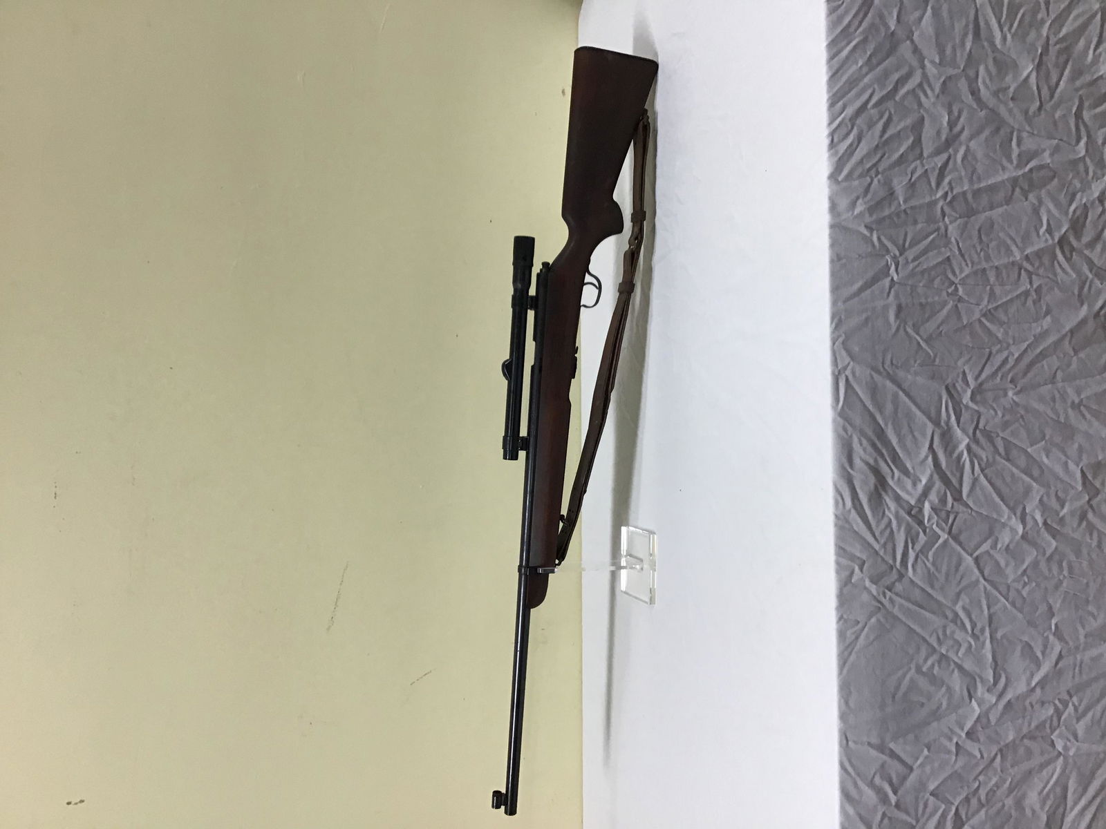Savage model 19 Rifle with scope: This nice rifle is a Savage model 19. caliber is 22 LR. Serial number: 46049. Barrel measures 25in L overall. Includes weaver brackets no. 2803907 that hold the scope. Scope has no identifying marks.