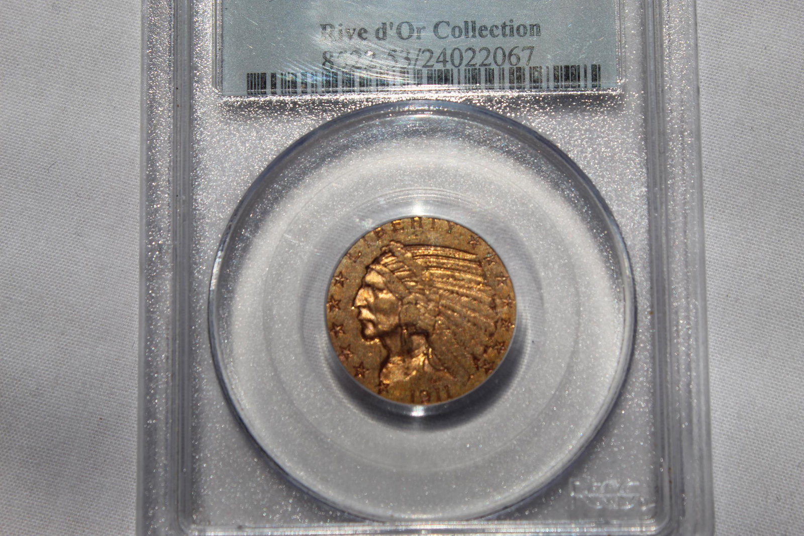 Graded 1911-S AU53 Indian Head 5 Dollar Coin: This 1911-S Indian Head 5 Dollar Coin is graded by PCGS as 1911-S AU53 $5 Indian Head Coin. It is designed by Bela Lyon Pratt, was minted in San Francisco along with 1,416,000 others that year. It is 